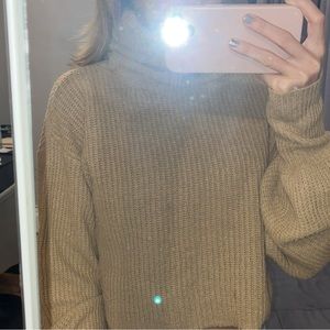 Cropped brown turtleneck nude sweater
